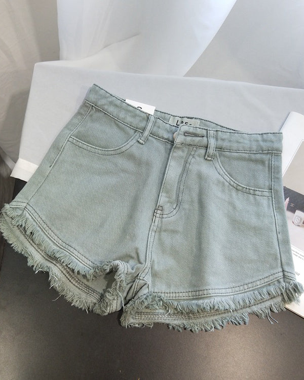 Einfarbige Retro-Jeansshorts mit hoher Taille, Fransen und offenem Saum