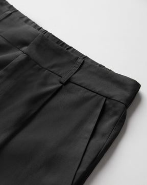 Pantalones extragrandes de talle alto con pliegues en la parte delantera 