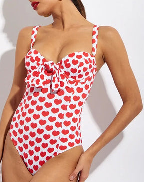 Traje de baño de una pieza estampado con cordones y falda de playa con tirantes