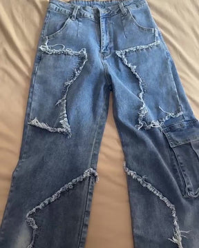 Lockere, gerade Jeans mit Sternquaste und Schnittkanten