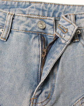 Jeans ajustados ligeros lavados con paneles en contraste de talle medio