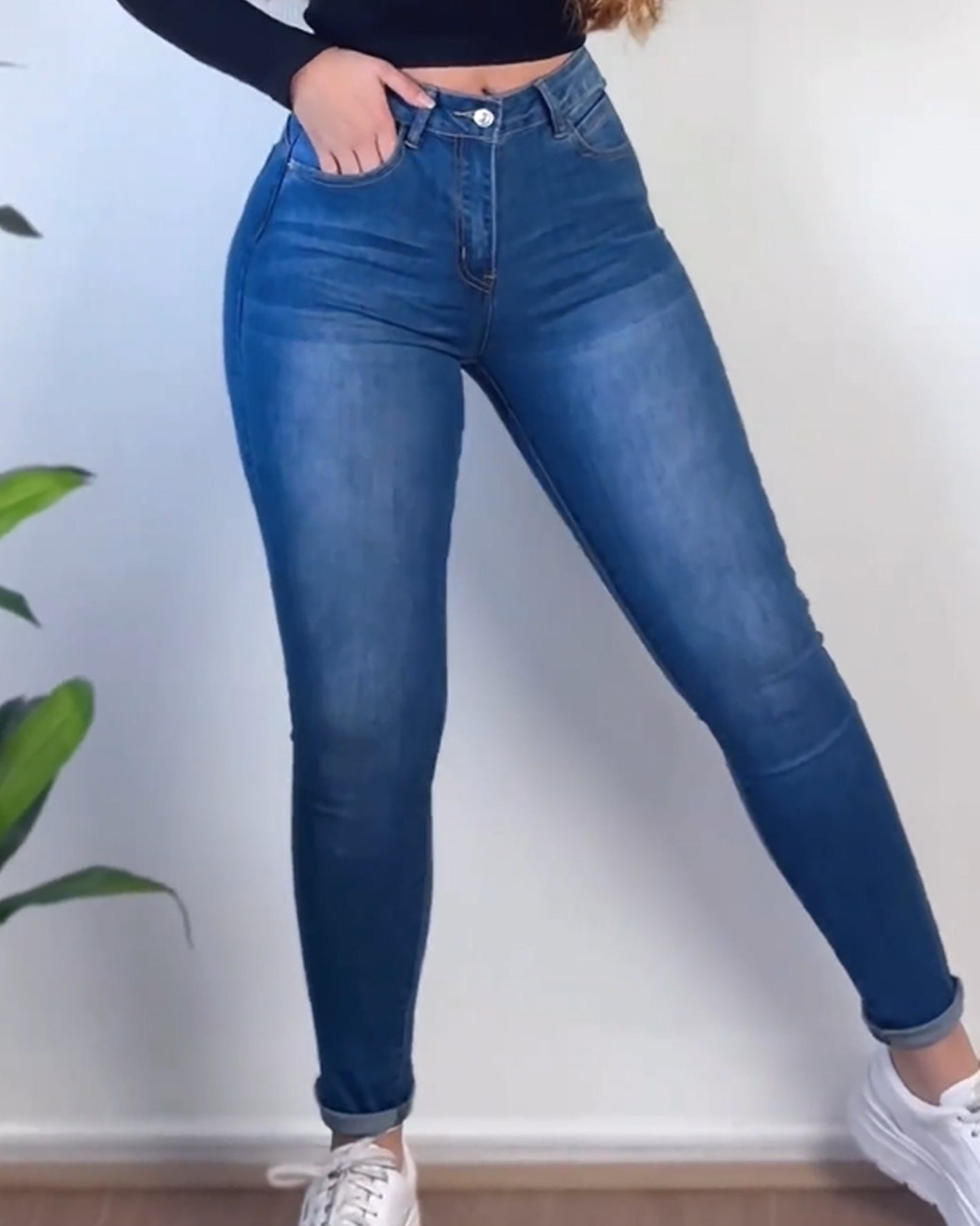 Jeans mit formendem Gürtel